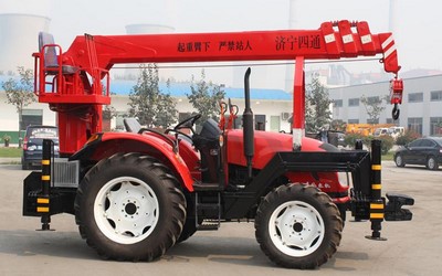 Tractor con grúa